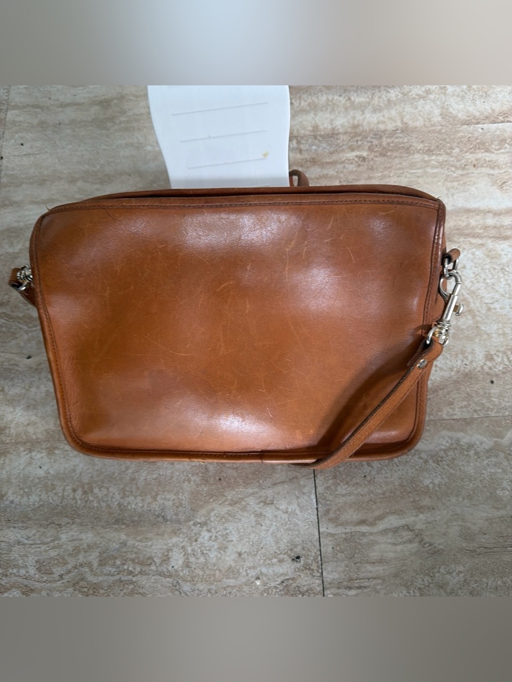 Sleek Tan Leather Crossbody Bag with Wrist Strap